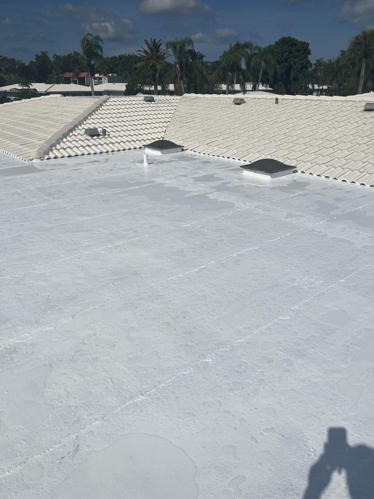 Slide of S F Roofing Quest