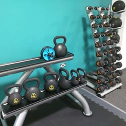 PureGym - Light free weights in the stretching zone.