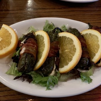Tres Potrillos - Appetite: Jalapeños stuffed with cheese and wrapped in bacon. Hot, but nice! - Mexican Near Me - Medina, Ohio Tres Potrillos - Appetite: Jalapeños stuffed with cheese and wrapped in bacon. Hot, but nice! - Mexican Near Me - Medina, Ohio