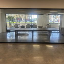 CustomBuilt-ins.com - Custom oak stained conference table 192" x 60" with 3" edge with custom legs. All mitered edge construction, custom finished in a flat sheen