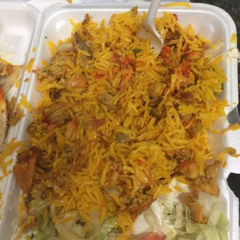 Halal Cart - two trays of food on a table - Street Vendors Near Me - Manhattan, New York Halal Cart - two trays of food on a table - Street Vendors Near Me - Manhattan, New York