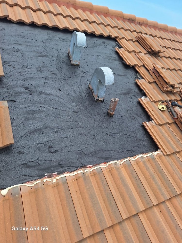 Slide of Janus Roofing