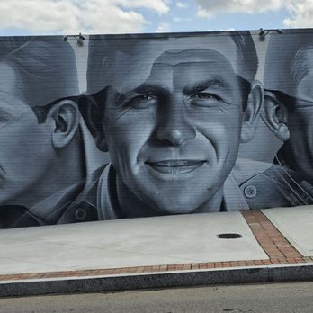 Squad Car Tours - Mural of Andy thru his career.   Artist spray painted this in 2 weeks. - Tours Near Me - Mount Airy, North Carolina