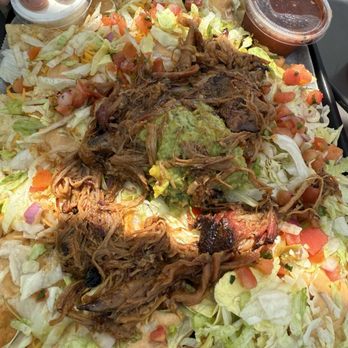 The Deck - pulled pork nachos - American Near Me - Muskegon, Michigan