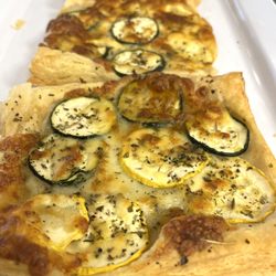 Farm To Cake Bakery - Zucchini and squash, cheddar on our puff pastry.