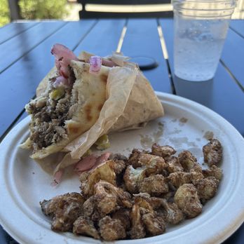 Ghassan's Fresh Mediterranean Eats - Chicken shawarma pita with fried cauliflower - Mediterranean Near Me - Greensboro, North Carolina Ghassan's Fresh Mediterranean Eats - Chicken shawarma pita with fried cauliflower - Mediterranean Near Me - Greensboro, North Carolina