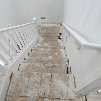 JG Flooring - a view down a flight of stairs - Flooring Near Me
