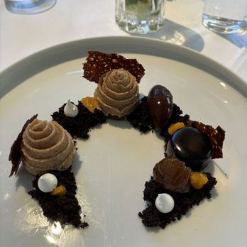 Jean-Georges - Mont Blanc Dessert: Crispy Meringues covered in Chestnut Puree with Chocolate Cake Crumbs, Chocolate Gelato, Mini Expresso Cake - French Near Me - New York, New York