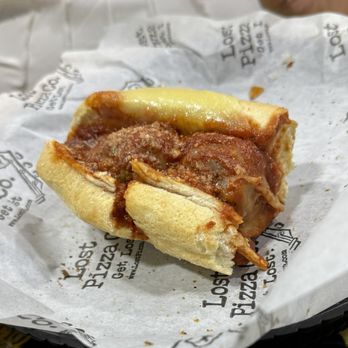 Lost Pizza - Half-eaten Meatball Sub - Sandwiches Near Me - Pensacola, Florida Lost Pizza - Half-eaten Meatball Sub - Sandwiches Near Me - Pensacola, Florida