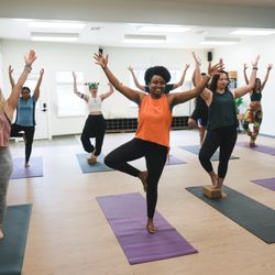 Soul Strong Yoga - Balanced and strong in tree pose. A welcoming class for all levels at Soul Strong Yoga.
