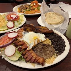 Guanachapis Express - Montanero. Bistec Encebollado* / Steak*. Green Spicy salsa