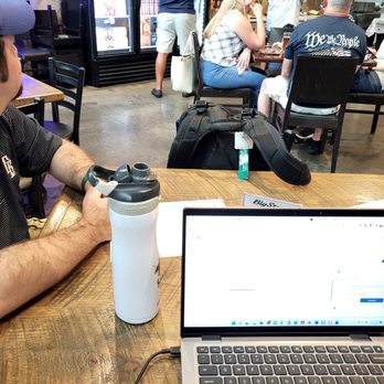 Big Storm Brewery- Clearwater - Space for laptops. Husband for scale . - Breweries Near Me - Clearwater, Florida Big Storm Brewery- Clearwater - Space for laptops. Husband for scale . - Breweries Near Me - Clearwater, Florida