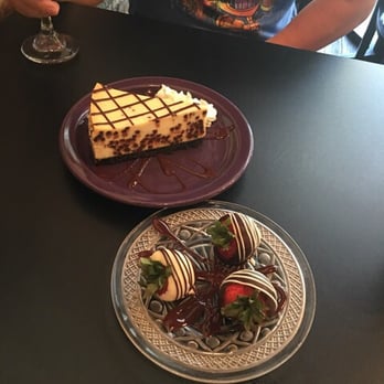 Lulu's Chocolate Bar - White chocolate chip cheesecake and chocolate covered strawberries. - Desserts Near Me - Savannah, Georgia