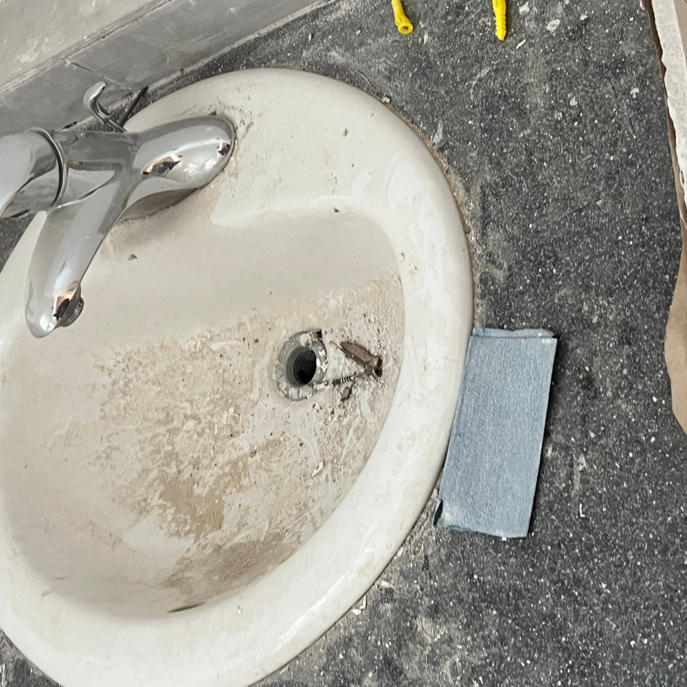 JD Home Lawn - a sink with a broken faucet - Snow Removal Near Me