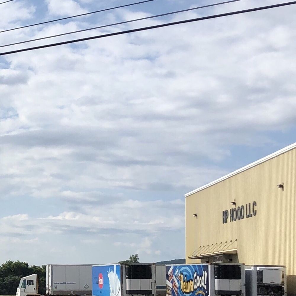 HP Hood - two semi trucks parked in a parking lot - Specialty Food Near Me - Arkport, New York