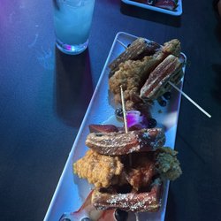 Lotus Rooftop - Chicken and waffles served on skewer stick + my blue rum drink