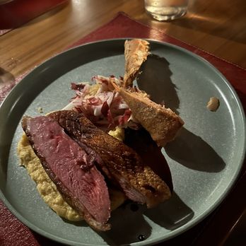 The Halyard - Dry Aged Crescent Farm Duck - duck was perfectly cooked (ordered med rare) with a crispy skin. - American Near Me - Greenport, New York The Halyard - Dry Aged Crescent Farm Duck - duck was perfectly cooked (ordered med rare) with a crispy skin. - American Near Me - Greenport, New York