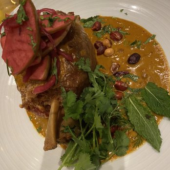 Maypop Restaurant - Banana leaf roasted pork shank in curry with Roti - New American Near Me - New Orleans, Louisiana