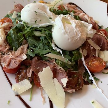 Oliver's Bistro - Avocado toast with heirloom tomatoes, arugula, Parma ham and poached eggs. Delicious. - Breakfast & Brunch Near Me - Miami Beach, Florida Oliver's Bistro - Avocado toast with heirloom tomatoes, arugula, Parma ham and poached eggs. Delicious. - Breakfast & Brunch Near Me - Miami Beach, Florida