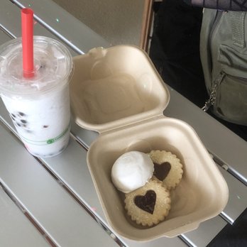 Tea and Chi - a cup of milk and cookies on a table - Tea Rooms Near Me - Vero Beach, Florida Tea and Chi - a cup of milk and cookies on a table - Tea Rooms Near Me - Vero Beach, Florida