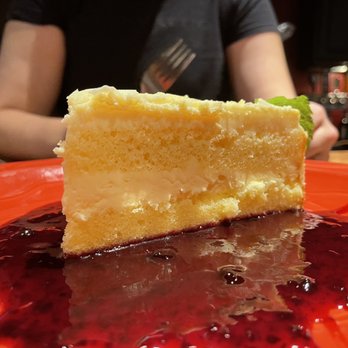 Ciao Mambo - lemon mascarpone cake with huckleberry amarone sauce - Italian Near Me - Missoula, Montana