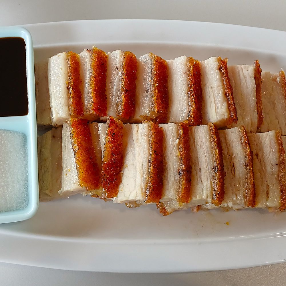 Tasty Modern Asian Kitchen - The amazing Macau-style roast pork belly slices. - Dim Sum Near Me - San Antonio, Texas Tasty Modern Asian Kitchen - The amazing Macau-style roast pork belly slices. - Dim Sum Near Me - San Antonio, Texas