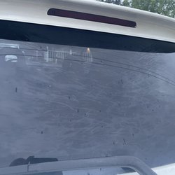 Mister Car Wash - Rear window an hour after my wash. No rain...just a direct result of their "wash."