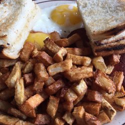 White Bay Restaurant - Eggs, bologna, home fries and bread.