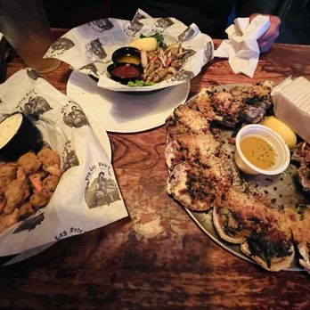 Peg Leg Pete's - Half n Half Blue Crab Claws (fried/ sautéed garlic butter) Rockefeller Oysters - Seafood Near Me - Pensacola Beach, Florida Peg Leg Pete's - Half n Half Blue Crab Claws (fried/ sautéed garlic butter) Rockefeller Oysters - Seafood Near Me - Pensacola Beach, Florida