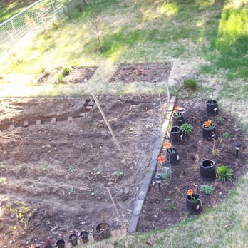 TJW Landscaping - a garden with a raised garden bed - Landscaping Near Me - Saint Peters, Missouri TJW Landscaping - a garden with a raised garden bed - Landscaping Near Me - Saint Peters, Missouri