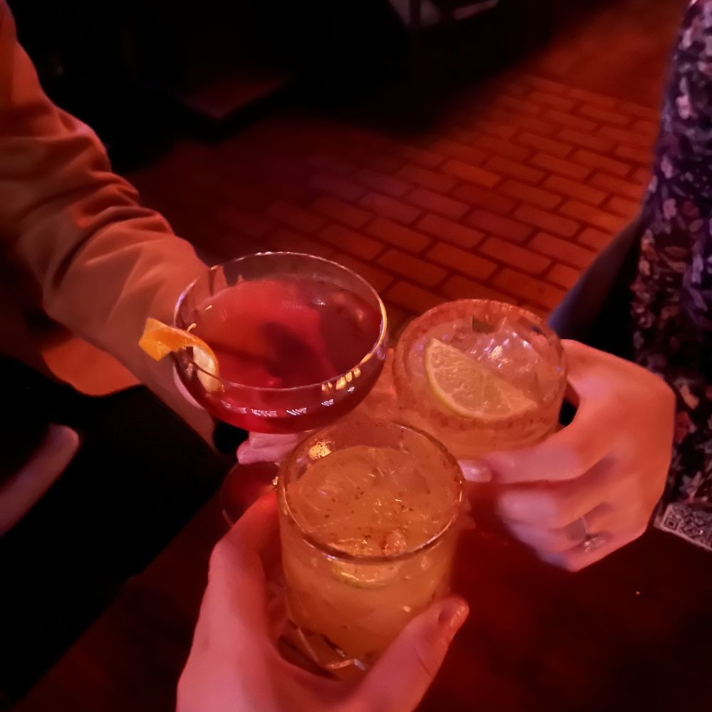 Reposado Bar & Lounge - a group of people toasting drinks - Music Venues Near Me - Toronto, Ontario Reposado Bar & Lounge - a group of people toasting drinks - Music Venues Near Me - Toronto, Ontario