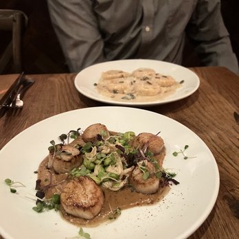 The Warren - Top: butternut squash ravioli; Bottom: Pan Seared Scallops - Gastropubs Near Me - New York, New York