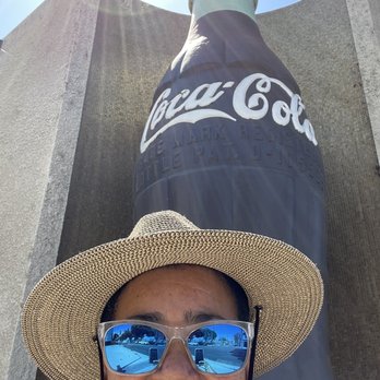 Coca-Cola Building - The building definitely has an awesome historical vibe with the massive coke bottles poised around it. Note my selfie. - Landmarks & Historical Buildings Near Me - Los Angeles, California Coca-Cola Building - The building definitely has an awesome historical vibe with the massive coke bottles poised around it. Note my selfie. - Landmarks & Historical Buildings Near Me - Los Angeles, California