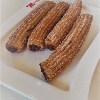 Manolo - Warm, chocolate filled churros, what is their not to love! - Coffee & Tea Near Me - Miami Beach, Florida Manolo - Warm, chocolate filled churros, what is their not to love! - Coffee & Tea Near Me - Miami Beach, Florida