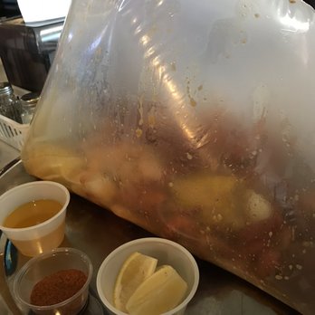 Laughing Crab - Gift bag of shrimp, snow crab and crawfish combo - Seafood Near Me - Tyler, Texas