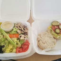 Salad on the left as substitute for fries and tuna sandwich on the right. Salad on the left as substitute for fries and tuna sandwich on the right.