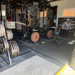 Weights, smith machine, deadlift platform