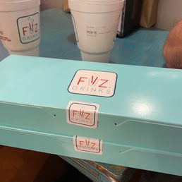 a blue box with stickers on it