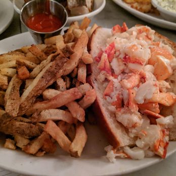 Neptune Oyster - Hot lobster roll with fries - Seafood Near Me - Boston, Massachusetts