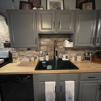 Classy Cleaners & Painting - Cabinet painting new butcher block counter top with a matte black sink and some nice stone black splash - General Contractors Near Me - Rensselaer, New York Classy Cleaners & Painting - Cabinet painting new butcher block counter top with a matte black sink and some nice stone black splash - General Contractors Near Me - Rensselaer, New York
