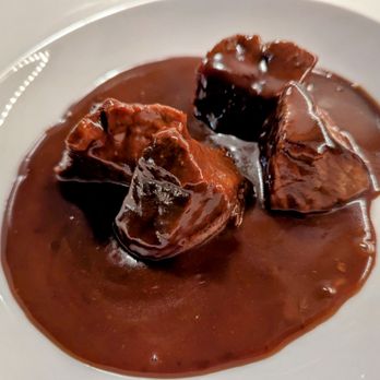 Sallie's Bistro - Beef stew in dark ale and chocolate - Belgian Near Me - Dunedin, Florida Sallie's Bistro - Beef stew in dark ale and chocolate - Belgian Near Me - Dunedin, Florida