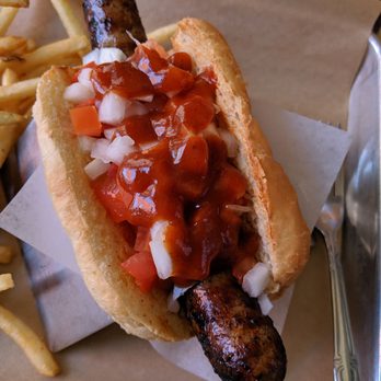 Bangers & Brews - Westside - IPA Sausage, diced tomatoes, diced onions, and Curry ketchup - German Near Me - Bend, Oregon Bangers & Brews - Westside - IPA Sausage, diced tomatoes, diced onions, and Curry ketchup - German Near Me - Bend, Oregon