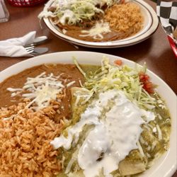 Chicken enchiladas with green sauce and a taco and sopa