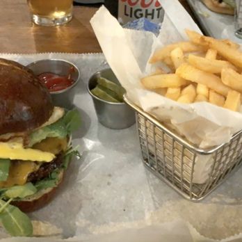 Tessie's bar & kitchen - Build your own burger: beef patty, pretzel bun, cheddar, avocado, arugula, and a fried egg! - American Near Me - Walpole, Massachusetts Tessie's bar & kitchen - Build your own burger: beef patty, pretzel bun, cheddar, avocado, arugula, and a fried egg! - American Near Me - Walpole, Massachusetts