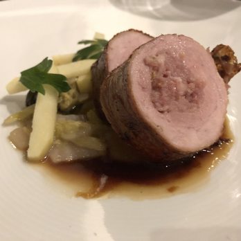 Copine - Bacon wrapped stuffed pork loin with braised cabbage, apple butter, and maple bourbon sauce - French Near Me - Seattle, Washington