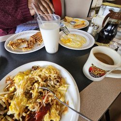 Waffle House - Hard grits, 2 sets of eggs, cause the first order was wrong, anorexic waffle, and hard hash browns.