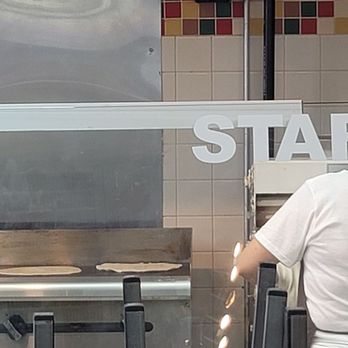 Montes Burritos - Cooking tortillas in the front - Mexican Near Me - Dallas, Texas Montes Burritos - Cooking tortillas in the front - Mexican Near Me - Dallas, Texas