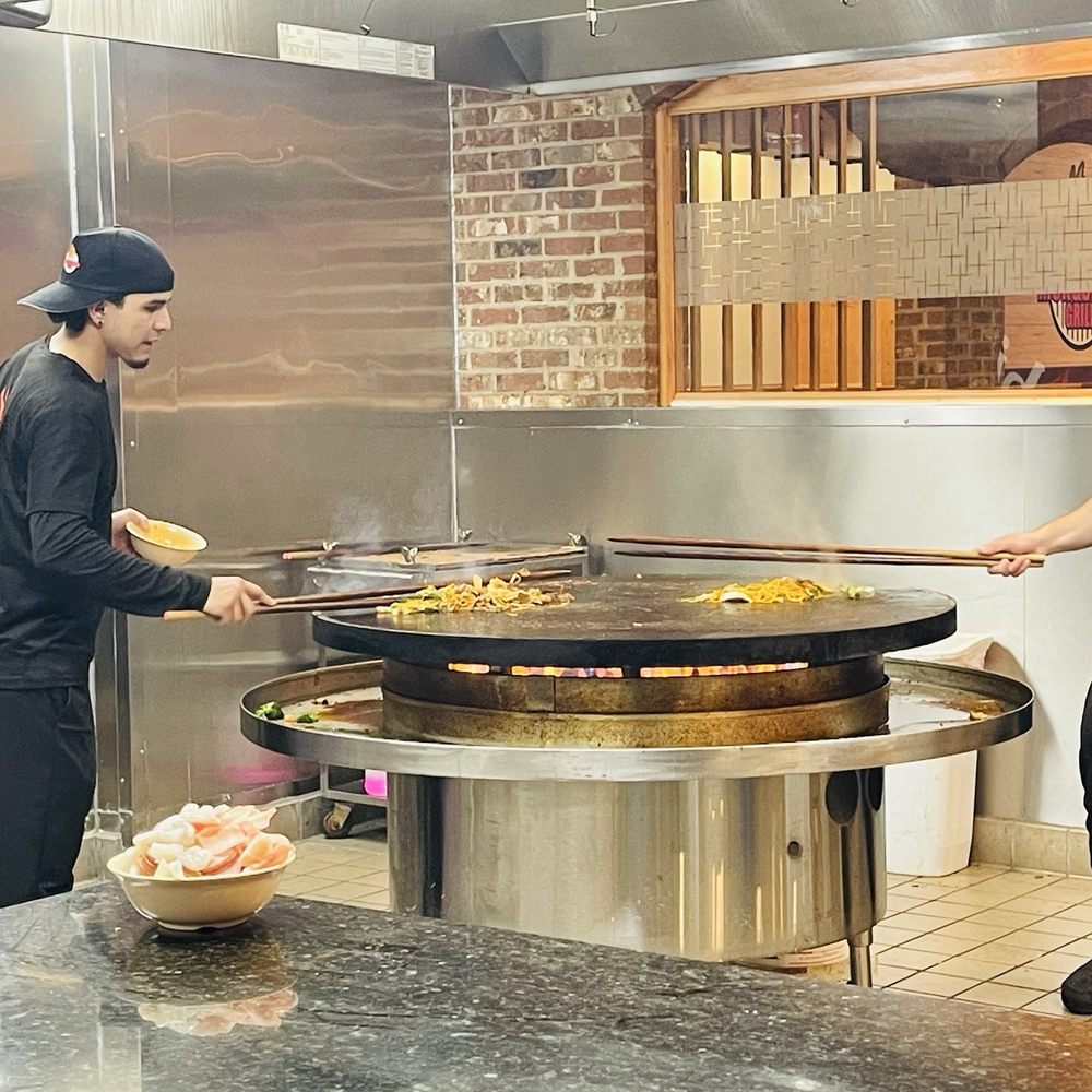 Grill masters cooking your food to order Grill masters cooking your food to order