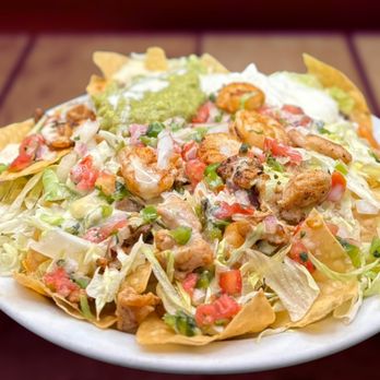 Trojan’s Mexican Grill - Nacho Loco. truly Loco. Please come and try to finish tis plate. - Mexican Near Me - Troy, Alabama Trojan’s Mexican Grill - Nacho Loco. truly Loco. Please come and try to finish tis plate. - Mexican Near Me - Troy, Alabama