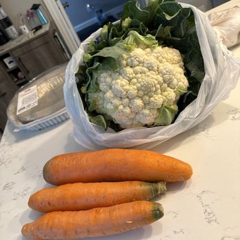 Eastern Market - Humongous cauliflower for $7, basket of huge carrots. - Farmers Market Near Me - Detroit, Michigan